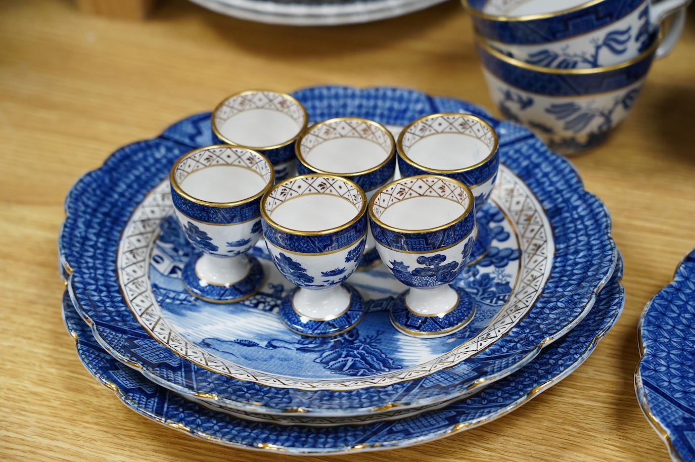 A large collection of Booths Real Old Willow, Woods Ware Willow and Old Chelsea blue and white dinner wares - condition - fair to good